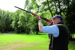 Man shooting with Baikal 12 bore