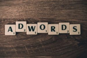 ppc advertising - image of scrabble letters spelling out Adwords